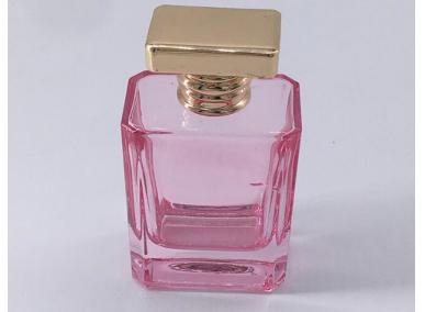 空のピンクの香水瓶