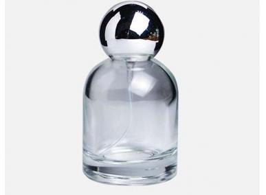 滑らかなガラスの香水瓶
